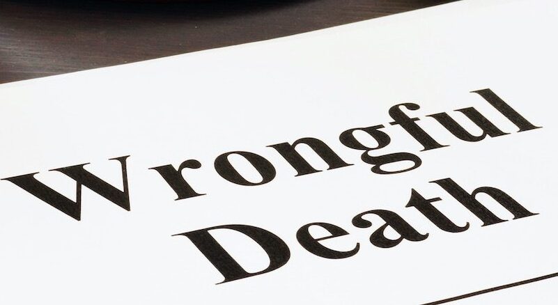 A close up of a document showing a text ‘Wrongful Death’