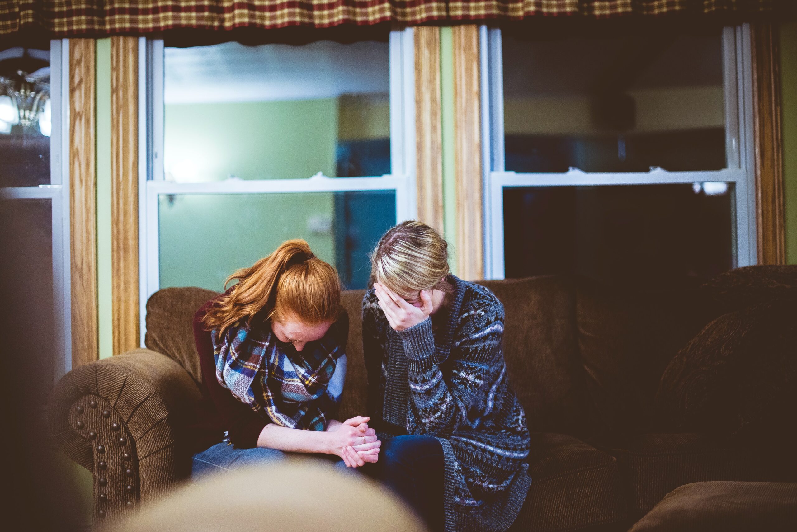 Two people grieving