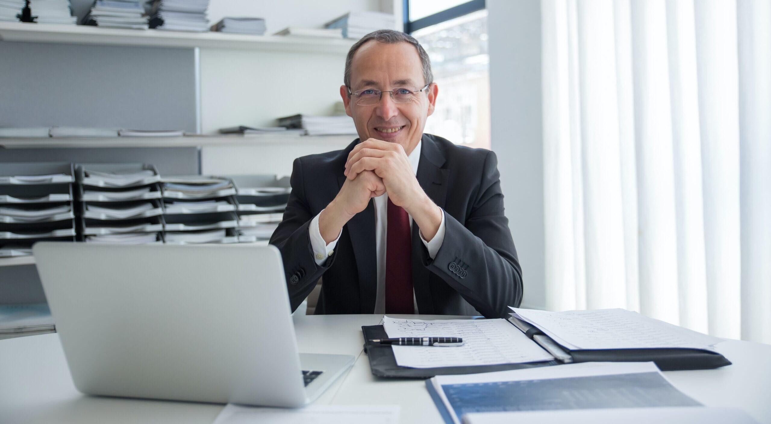 A lawyer sitting in his office