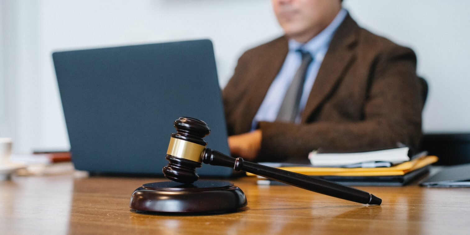 An image of an attorney and a gavel