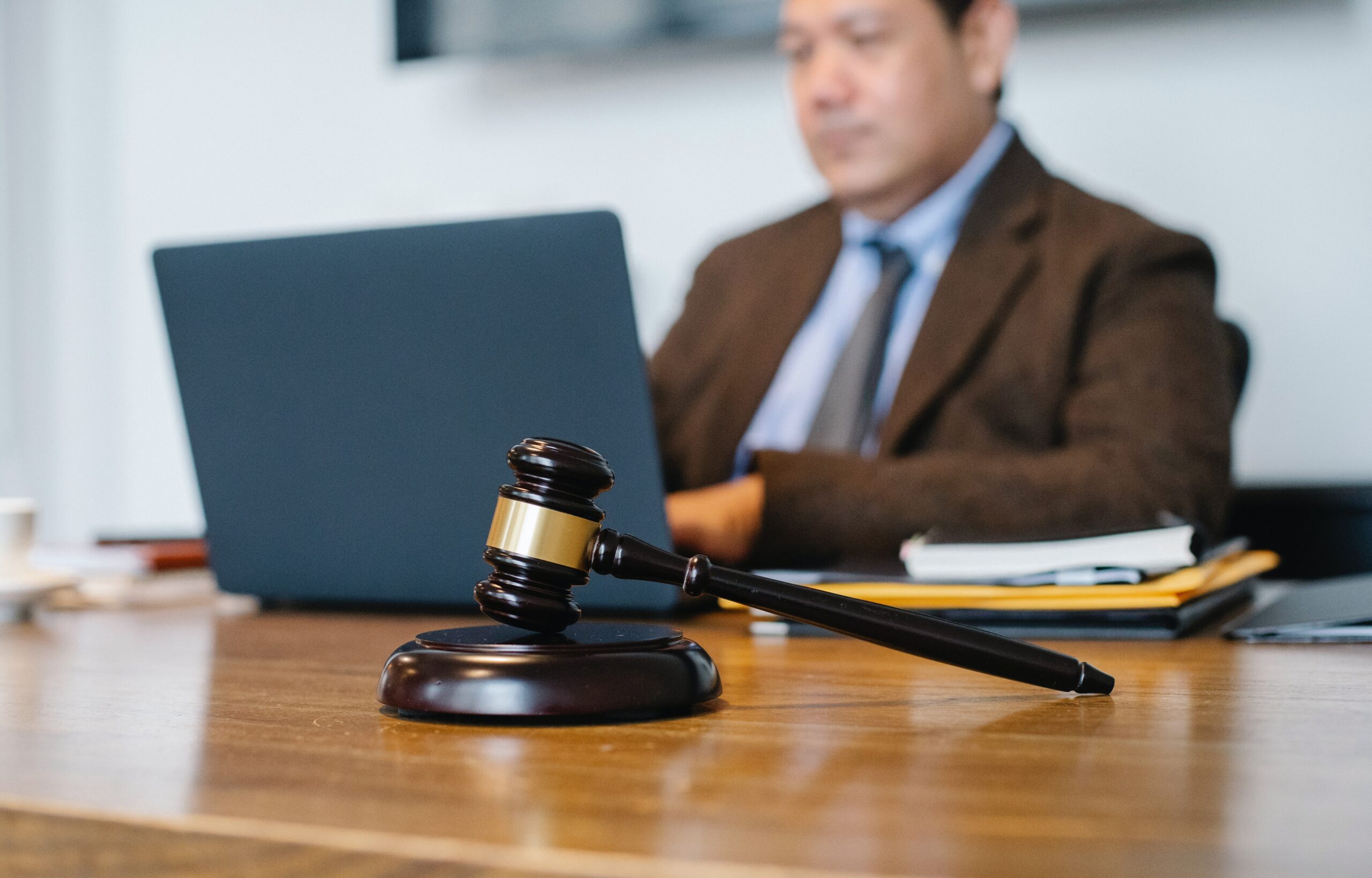 An image of an attorney and a gavel