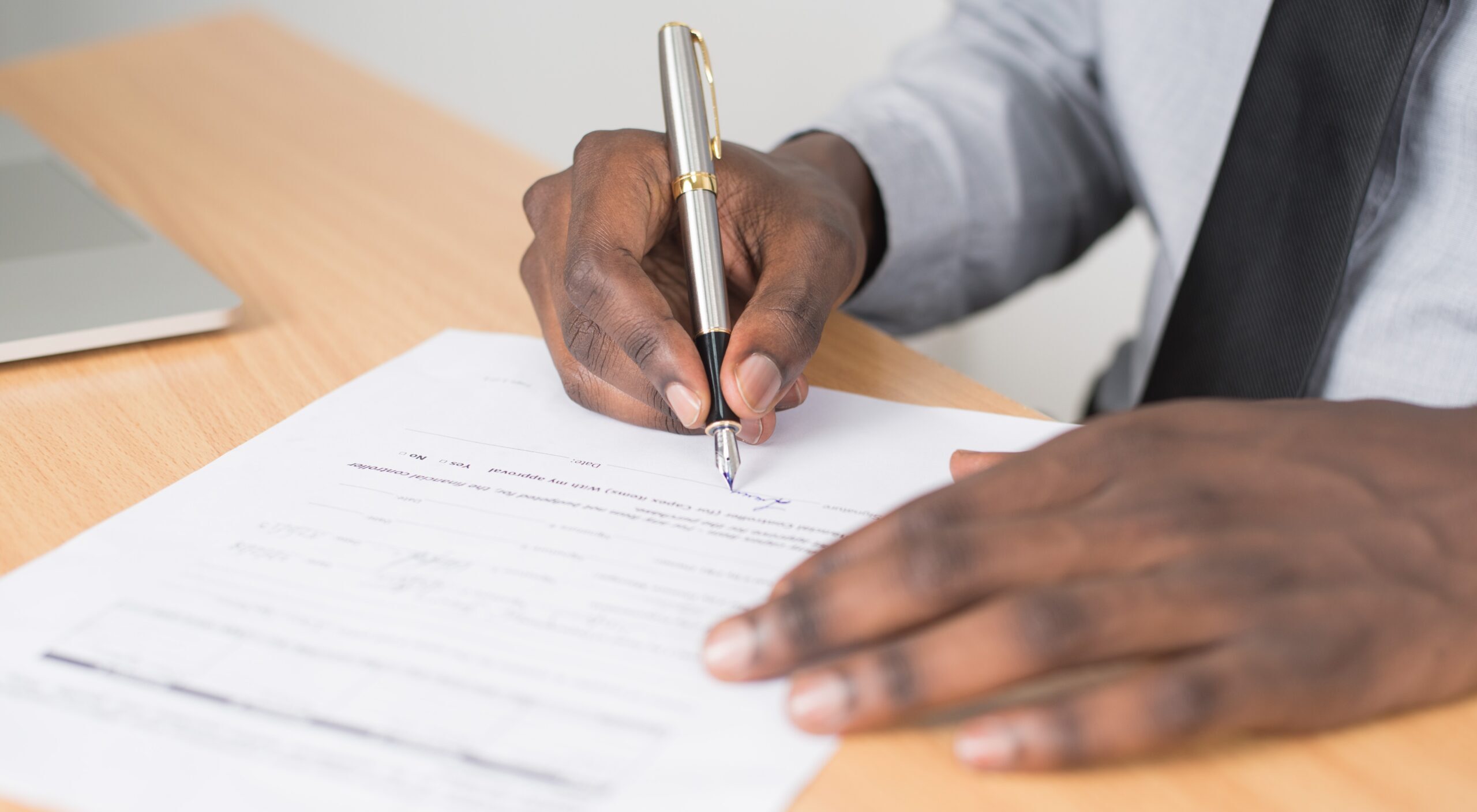 A person signing contract